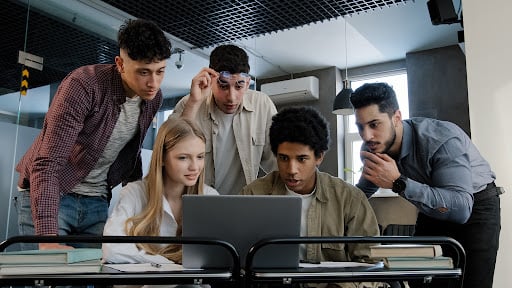 Real estate agent conducting a focus group with 4 other participants to determine how effective the wording of their direct mail campaign will be.