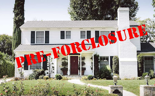 Home with the text “pre-foreclosure” written across it, which represents a motivated seller and contact information readily available through skip tracing.