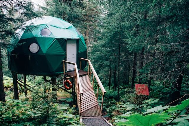 Short term rental in a dome style located in the forest, listed on Airbnb