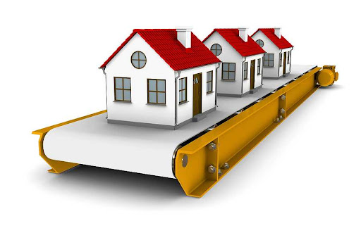 Illustration of homes on a conveyor belt to signify the concept of wholesaling real estate.